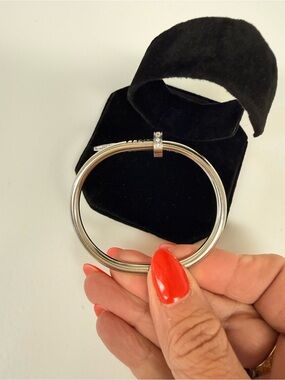 Polished Silver-Tone Women's Hinged Bracelet with Crystal Accent
